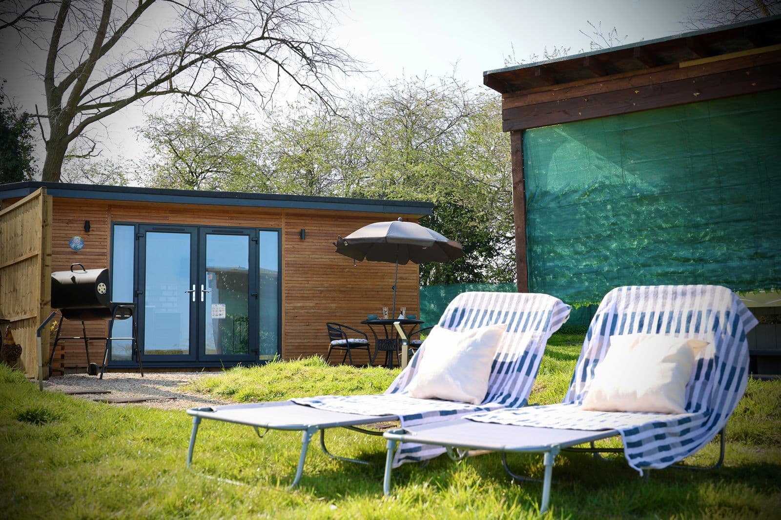 Snowdrop Pod exterior — luxury glamping pod Norfolk